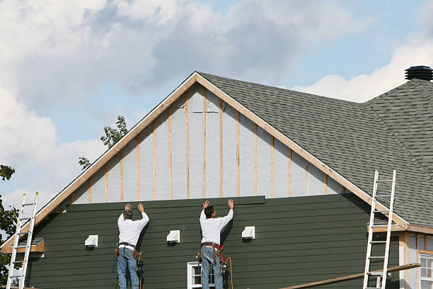 Professional Siding technician working in Plymouth, NC